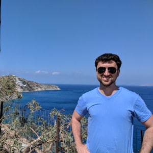 Mike walking along a cliff west of Heraklion, Crete